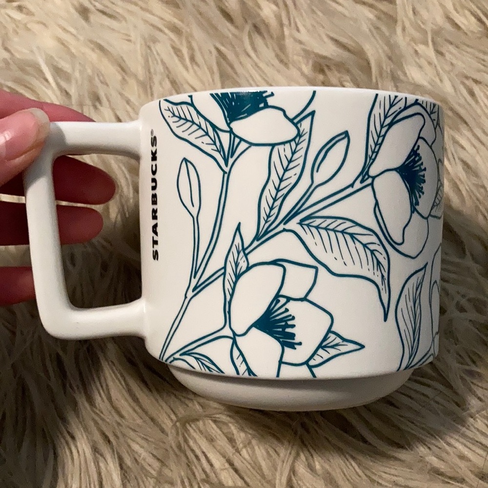 Starbucks mug. 14 oz white, turquoise and a light pink color. Lightly used